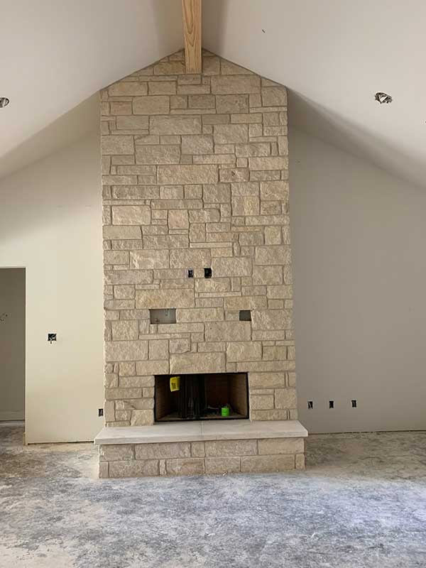 Commercial Stone Masonry Fireplace Vaulted Ceiling